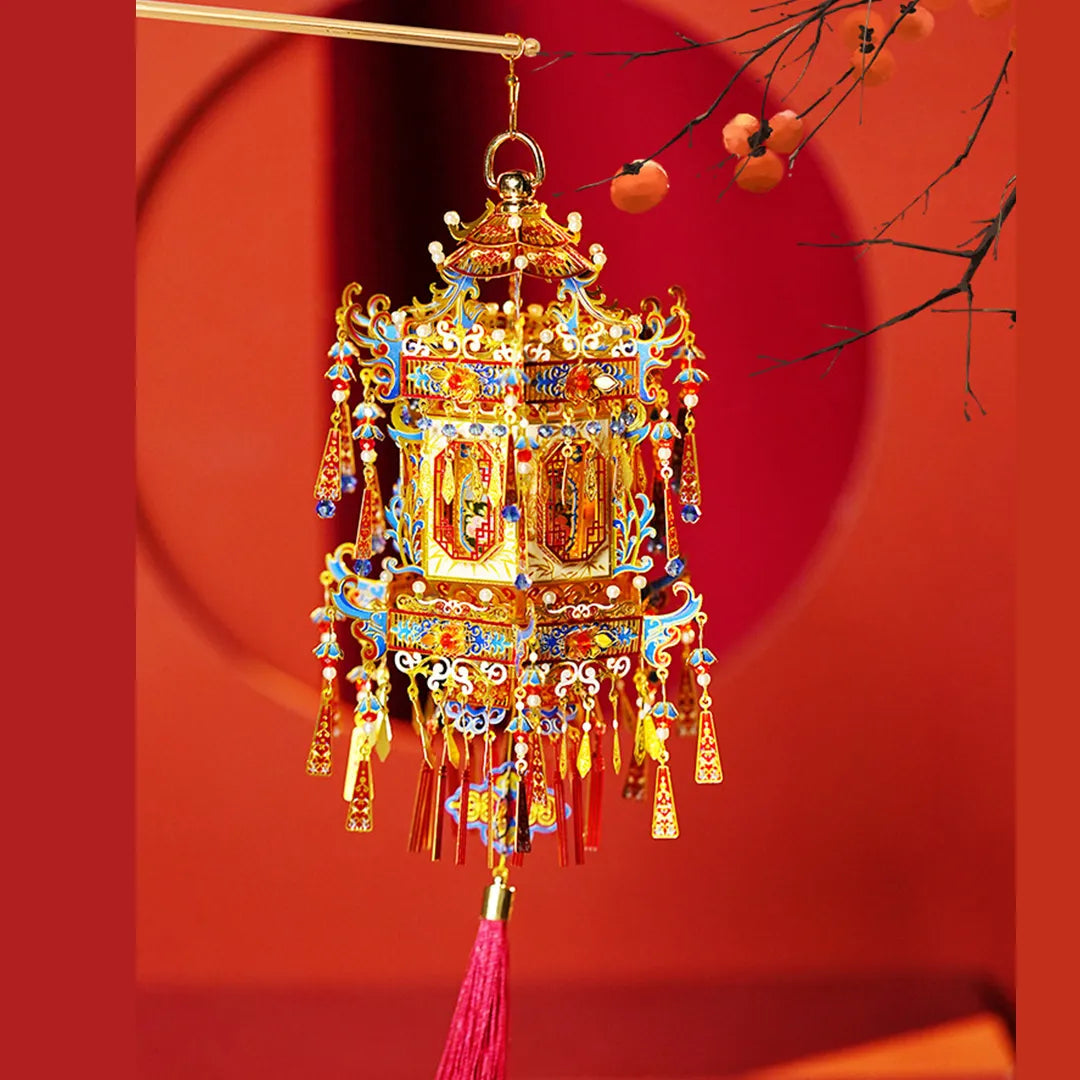 Completed palace lantern hanging against a red background