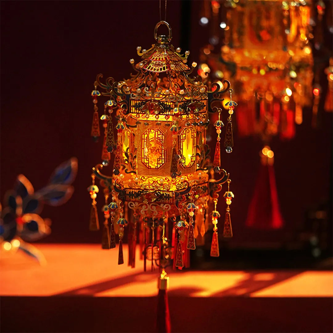 Completed palace lantern glowing in a dark, warmly lit setting